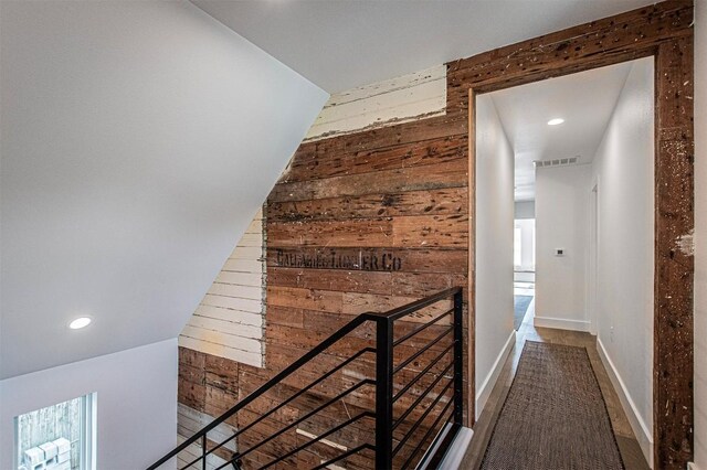 3405 Cedar St, Austin, TX 78705 - hall with an upstairs landing, wooden walls, and recessed lighting