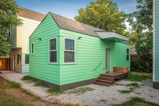 3405 Cedar St, Austin, TX 78705 - rear view of property featuring a shingled roof