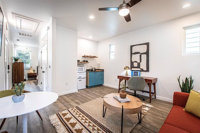 3405 Cedar St, Austin, TX 78705 - living area with attic access, ceiling fan, wood finished floors, and recessed lighting