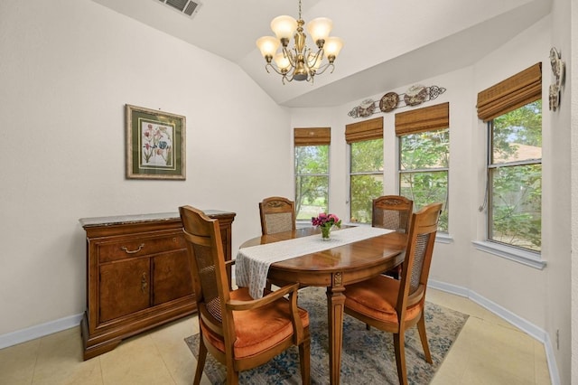 1831 Greening Way, Leander, TX 78641 - dining room with a chandelier, lofted ceiling, and light tile patterned flooring