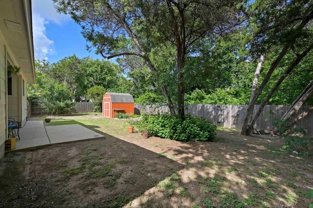 1831 Greening Way, Leander, TX 78641 - fenced backyard featuring a patio and a storage unit