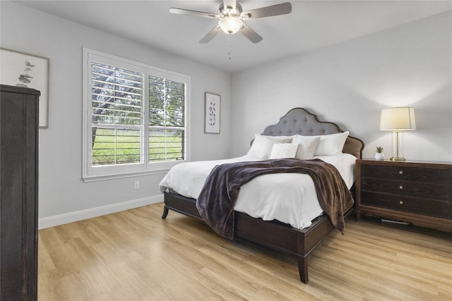 11400 W Parmer Ln Unit 4, Cedar Park, TX 78613 - bedroom with light wood-type flooring and ceiling fan