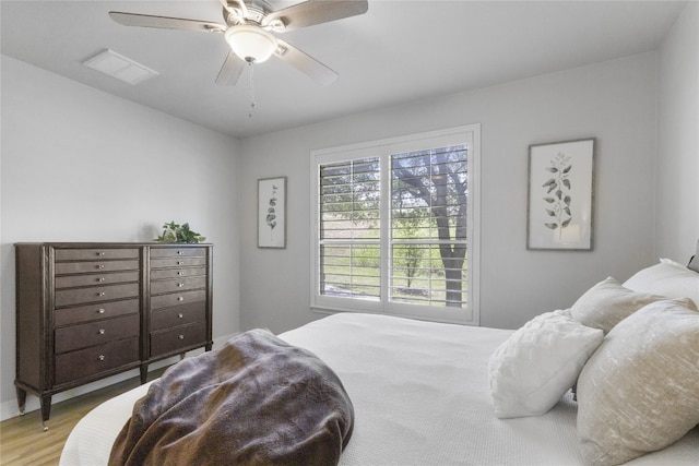 11400 W Parmer Ln Unit 4, Cedar Park, TX 78613 - bedroom featuring wood finished floors and a ceiling fan