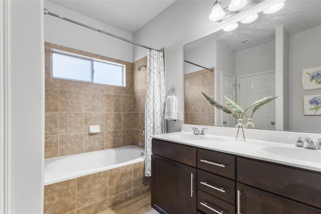 11400 W Parmer Ln Unit 4, Cedar Park, TX 78613 - bathroom with tiled shower / bath and double vanity