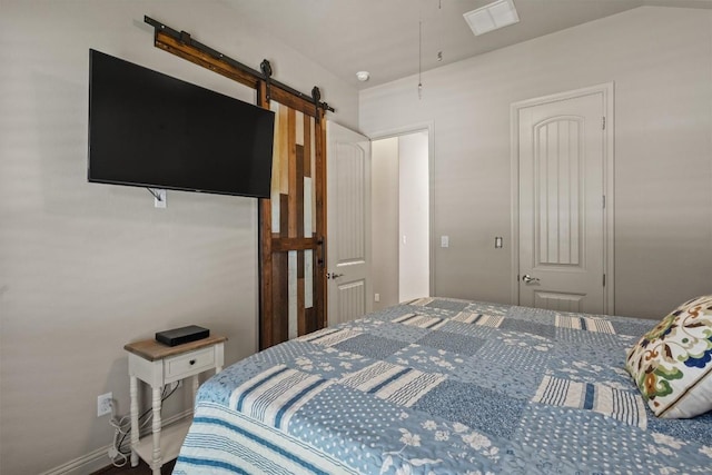 413 Fair Oaks Dr, Georgetown, TX 78628 - bedroom featuring a barn door
