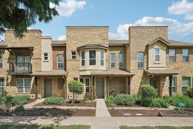 7503 Sugar Magnolia St, Austin, TX 78757 - multi unit property featuring stone siding