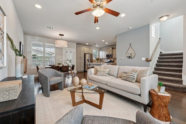 7503 Sugar Magnolia St, Austin, TX 78757 - living area featuring dark wood-style flooring, recessed lighting, a ceiling fan, and stairway
