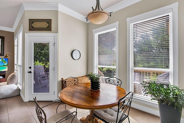 2207 Stonehaven, San Marcos, TX 78666 - dining space with light tile patterned floors, ornamental molding, and healthy amount of natural light