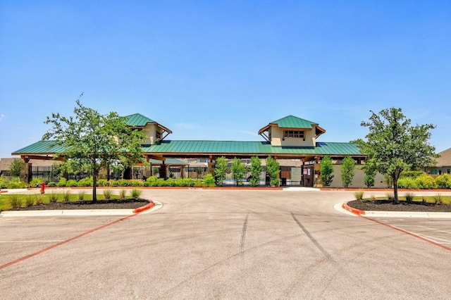 6042 Roma St, Round Rock, TX 78665 - view of building exterior featuring uncovered parking