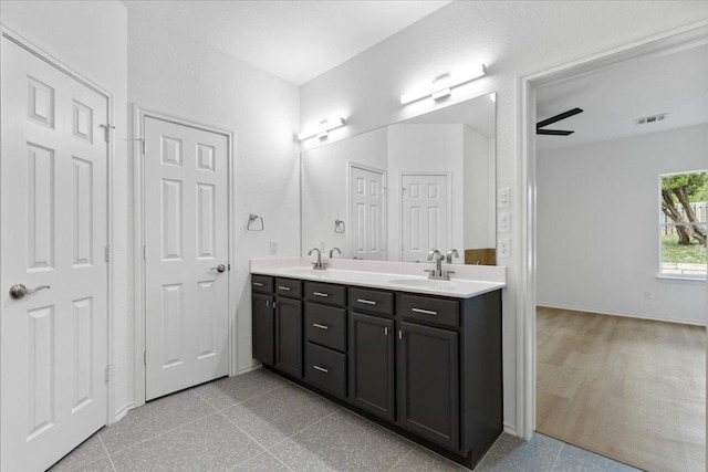 204 S Meadowlark St, Lakeway, TX 78734 - full bath featuring double vanity and baseboards