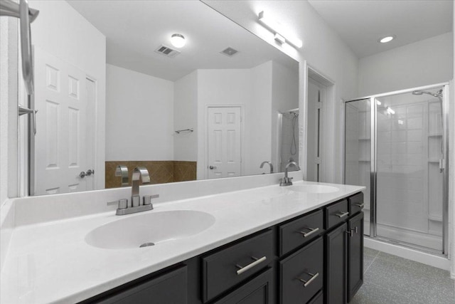 204 S Meadowlark St, Lakeway, TX 78734 - bathroom featuring double vanity and a stall shower