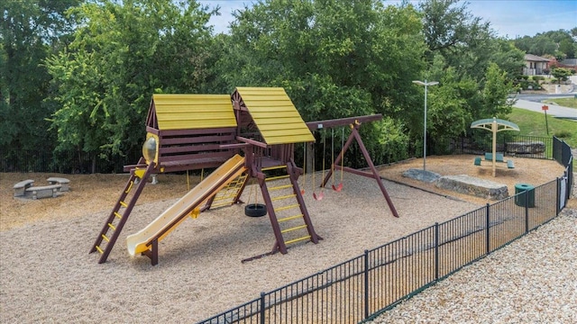204 S Meadowlark St, Lakeway, TX 78734 - view of playground featuring view of wooded area