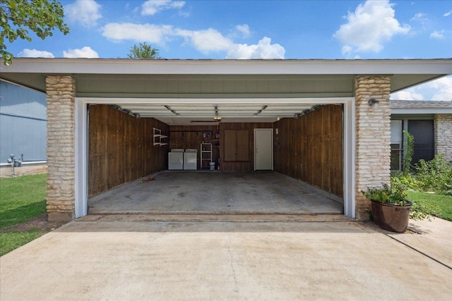 4910 Wing Rd, Austin, TX 78749 - garage with separate washer and dryer and driveway