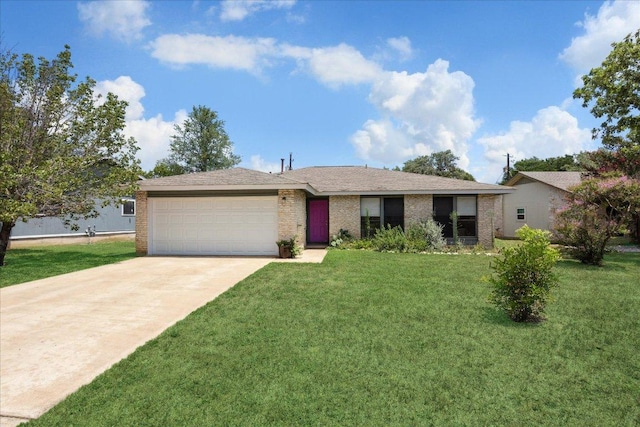 4910 Wing Rd, Austin, TX 78749 - ranch-style home featuring a garage, concrete driveway, a front yard, and brick siding