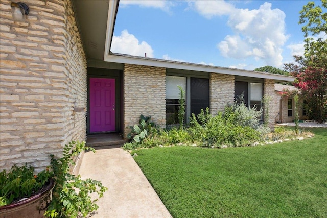 4910 Wing Rd, Austin, TX 78749 - property entrance with a yard