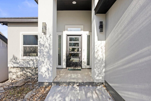 1305 Laurel Cv, Marble Falls, TX 78654 - view of exterior entry featuring stucco siding