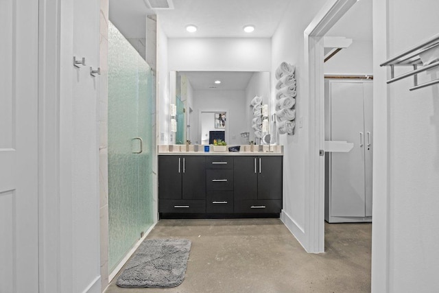 1305 Laurel Cv, Marble Falls, TX 78654 - full bath featuring concrete floors, a stall shower, and vanity