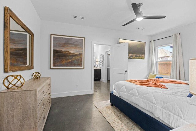 1305 Laurel Cv, Marble Falls, TX 78654 - bedroom featuring finished concrete floors and a ceiling fan