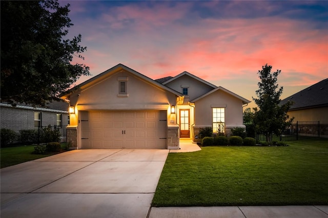 4924 Fiore Trl, Round Rock, TX 78665 - view of front of house with stucco siding, driveway, and a garage