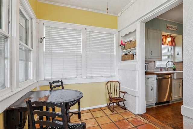 1004 Mitchell St, Gonzales, TX 78629 - sitting room featuring ornamental molding and light tile patterned floors