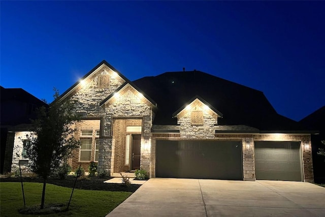 2233 Bellisa Vista Dr, Leander, TX 78641 - french country style house with concrete driveway, stone siding, a garage, and a yard