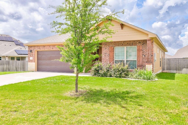 717 Friars Tuck Dr, Temple, TX 76502 - view of front of home with brick siding, concrete driveway, and a garage