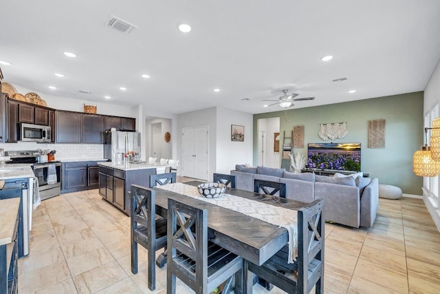 717 Friars Tuck Dr, Temple, TX 76502 - dining area with a ceiling fan and recessed lighting