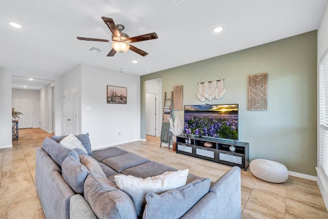 717 Friars Tuck Dr, Temple, TX 76502 - tiled living room with a ceiling fan and recessed lighting