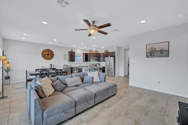 717 Friars Tuck Dr, Temple, TX 76502 - living area featuring a ceiling fan and recessed lighting