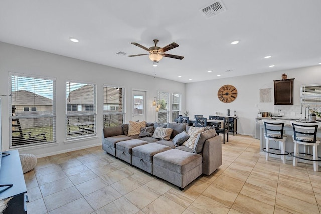 717 Friars Tuck Dr, Temple, TX 76502 - living area with plenty of natural light, ceiling fan, recessed lighting, and light tile patterned floors