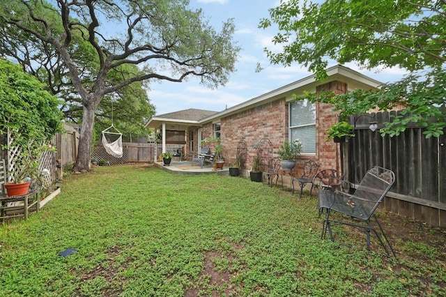 12112 Rancho Alto Rd, Austin, TX 78748 - fenced backyard with a patio area