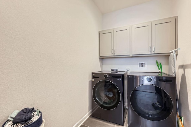 1209 Brasano Pl, Leander, TX 78641 - laundry room with independent washer and dryer, cabinet space, and tile patterned flooring