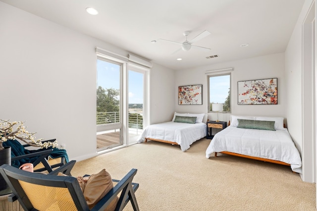 1417 Osprey Ridge Loop, Lago Vista, TX 78645 - bedroom with carpet floors, recessed lighting, ceiling fan, and access to outside