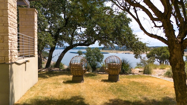 1417 Osprey Ridge Loop, Lago Vista, TX 78645 - view of grassy yard with a water view