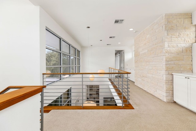 1417 Osprey Ridge Loop, Lago Vista, TX 78645 - corridor featuring an upstairs landing, light carpet, and recessed lighting