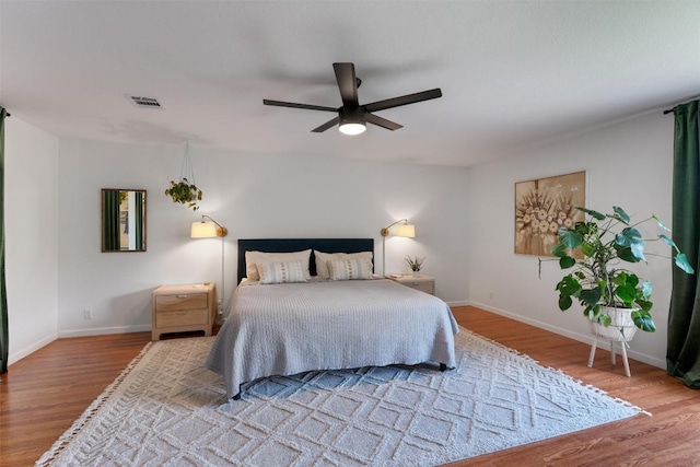 1105 Red Ranch Cir, Cedar Park, TX 78613 - bedroom with wood finished floors and ceiling fan