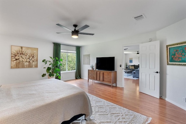 1105 Red Ranch Cir, Cedar Park, TX 78613 - bedroom with light wood-style floors and a ceiling fan