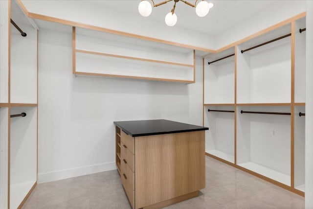 1000 Southlake Ranch Rd, Georgetown, TX 78628 - spacious closet featuring a chandelier