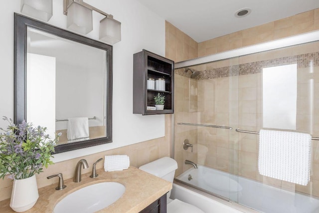 905 Minturn Ln, Austin, TX 78748 - full bathroom with vanity and bath / shower combo with glass door