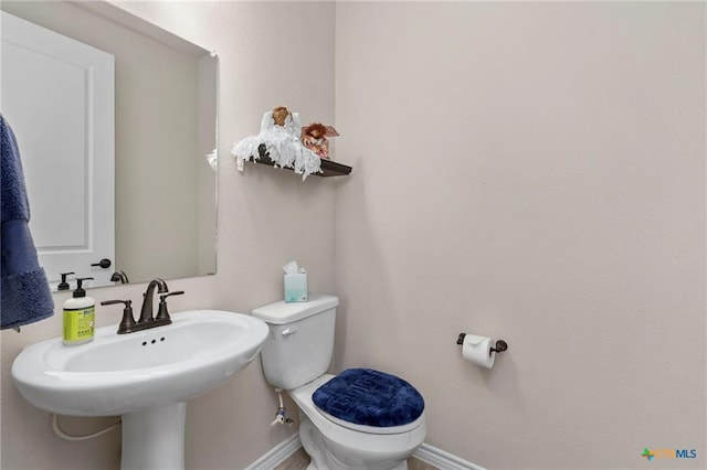 220 Bolivar Way Unit 101, San Marcos, TX 78666 - bathroom with toilet and baseboards