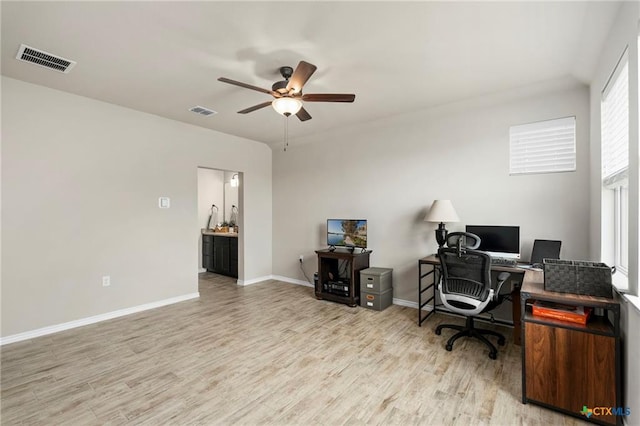 220 Bolivar Way Unit 101, San Marcos, TX 78666 - office space featuring a ceiling fan and light wood-style flooring