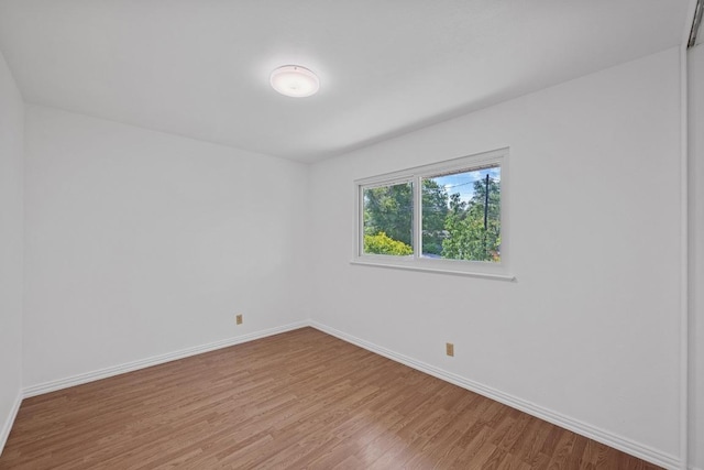 7003 Burnell Dr, Austin, TX 78723 - spare room with light wood-style floors and baseboards