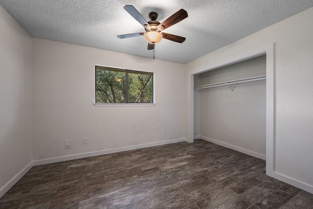 216 Country Rd, Georgetown, TX 78628 - unfurnished bedroom featuring a textured ceiling, a closet, ceiling fan, and dark wood finished floors