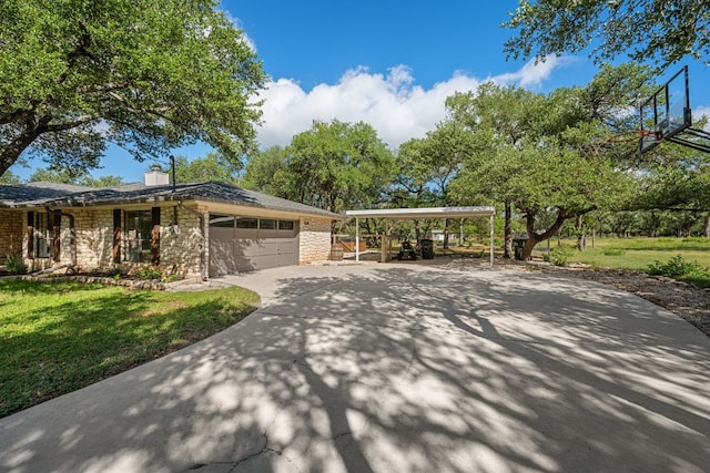 216 Country Rd, Georgetown, TX 78628 - view of property exterior featuring a garage, a yard, driveway, a chimney, and a carport