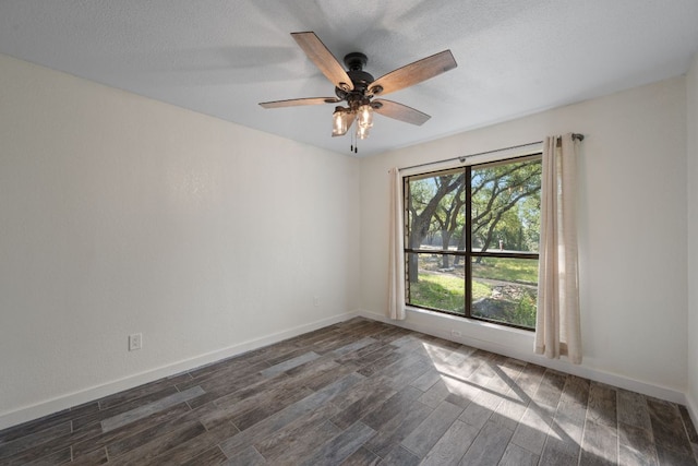 216 Country Rd, Georgetown, TX 78628 - spare room featuring dark wood finished floors and a ceiling fan