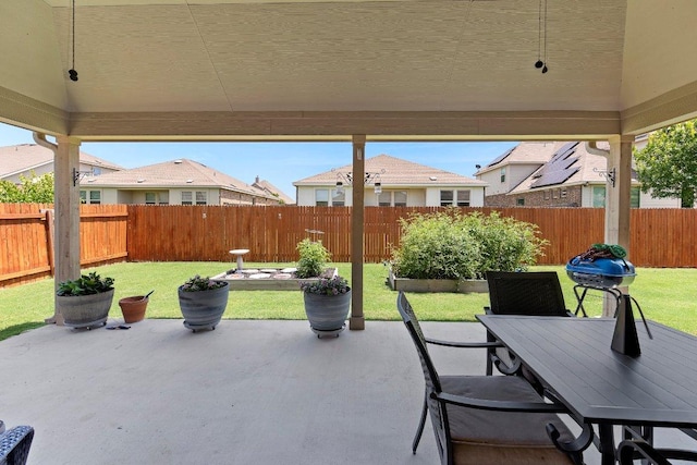 1008 Tabernash Dr, Leander, TX 78641 - fenced backyard with a patio, a residential view, and outdoor dining area