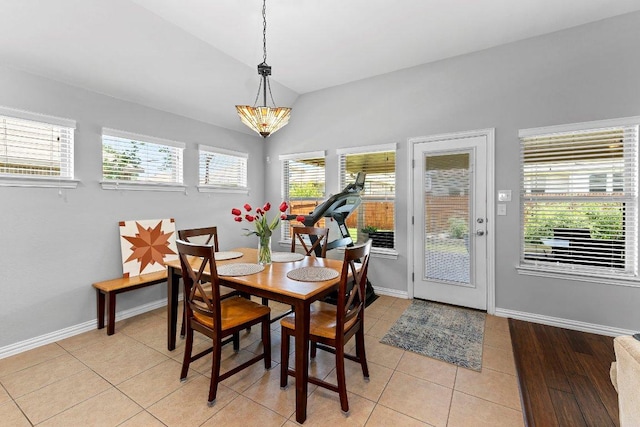 1008 Tabernash Dr, Leander, TX 78641 - dining room featuring lofted ceiling, a chandelier, and light tile patterned floors