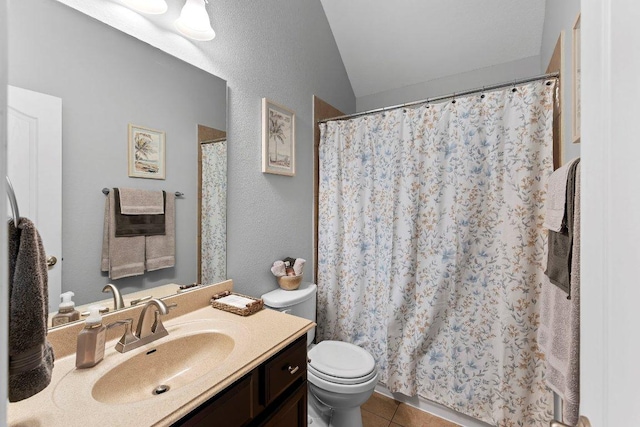 1008 Tabernash Dr, Leander, TX 78641 - full bathroom featuring vanity, lofted ceiling, tile patterned floors, and curtained shower