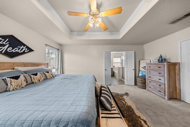203 Ponderosa Dr, Harker Heights, TX 76548 - bedroom featuring a tray ceiling, carpet flooring, ornamental molding, and ceiling fan