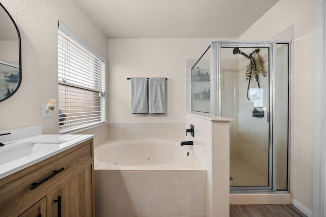 203 Ponderosa Dr, Harker Heights, TX 76548 - bathroom with a stall shower, vanity, a whirlpool tub, and wood finished floors